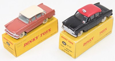 Lot 1868 - A French Dinky Toys boxed saloon group, two...