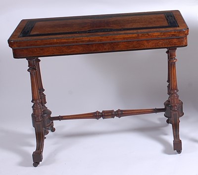 Lot 1109 - A Victorian Aesthetic Movement figured walnut...