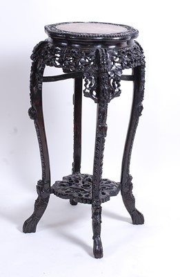 Lot 2457 - A large early 20th century Chinese carved...