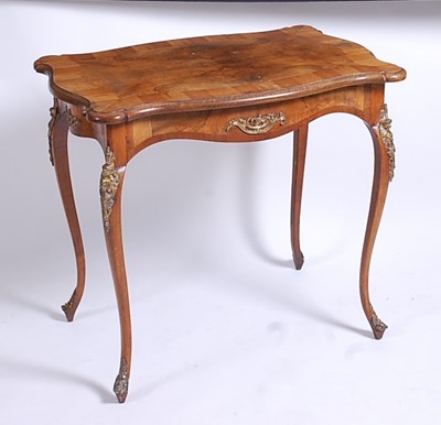 Lot 2604 - A late 19th century French walnut and figured...