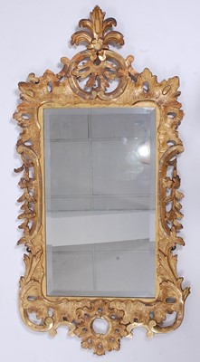Lot 2601 - A Rococo Revival giltwood and gesso pier glass,...