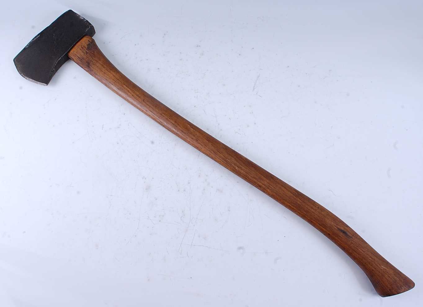 Lot 143 - A WW I trench axe, the head dated 1916, 88cm.