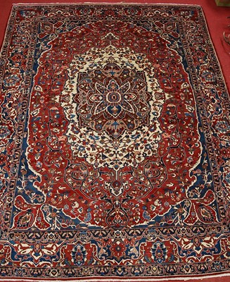 Lot 2592 - A Persian woollen Bakhtiari carpet, the red...
