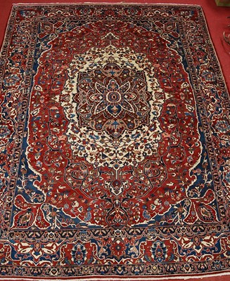 Lot 2441 - A Persian woollen Bakhtiari carpet, the red...