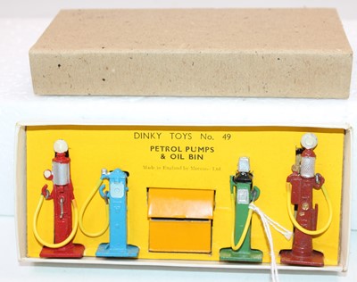 Lot 1040 - Dinky Toys pre-war No. 49 Petrol Pumps and Oil...