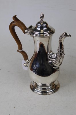Lot 232 - An early George III silver coffee pot, of pear...