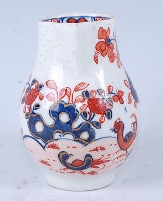 Lot 2047 - A Lowestoft porcelain sparrowbeak cream jug,...