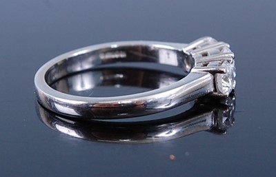 Lot 2364 - A platinum diamond 'trilogy' ring, arranged as...