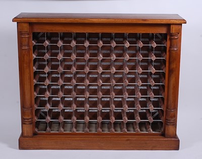 Lot 1544 - A contemporary oak wine rack, having...