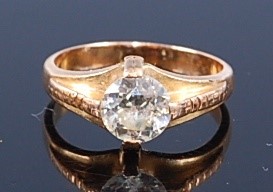 Lot 2376 - A 22ct gold diamond solitaire ring, the four...