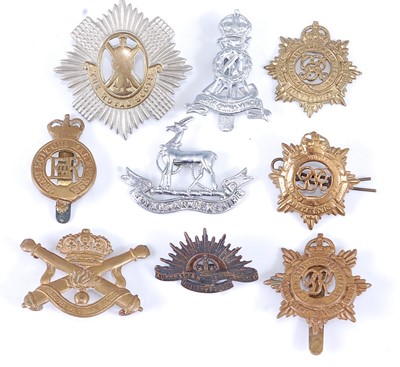 Lot 242 - A small collection of caps badges to include...