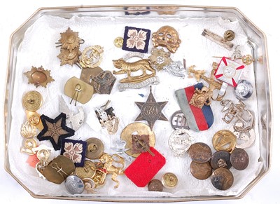 Lot 242 - A small collection of caps badges to include...
