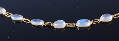 Lot 2370 - A contemporary yellow metal and moonstone set...