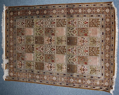 Lot 2593 - A Persian fineweave silk rug, the green-brown...