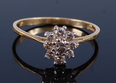 Lot 2367 - An 18ct gold diamond flower head cluster ring,...