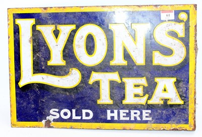 Lot 61 - An original Lyons Tea wall mounted double...