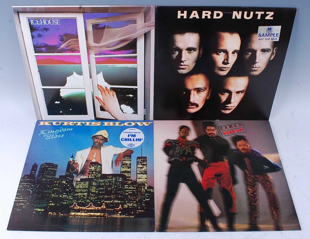 Lot 1036 - A collection of LP's and 12" singles, various...