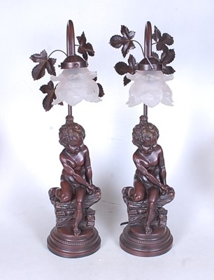 Lot 11 - A pair of 20th century French style resin...
