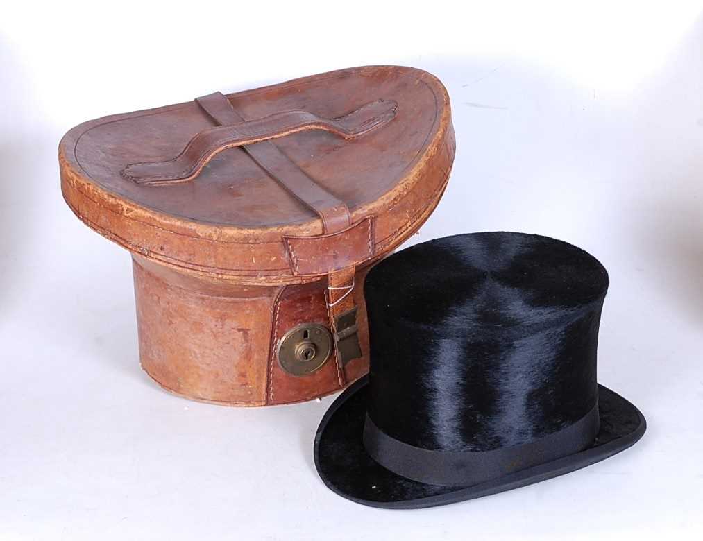 Lot 12 - A Victorian gentleman's black moleskin top-hat,...