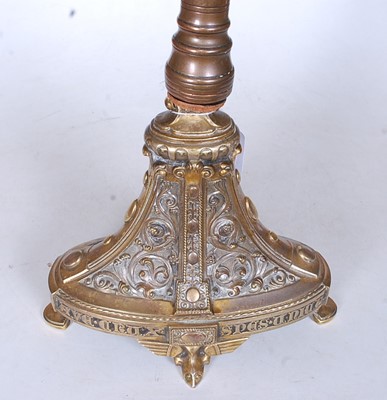Lot 21 - A Victorian brass and polychrome decorated...