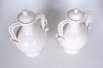 Lot 25 - A pair of continental white crackle glazed...