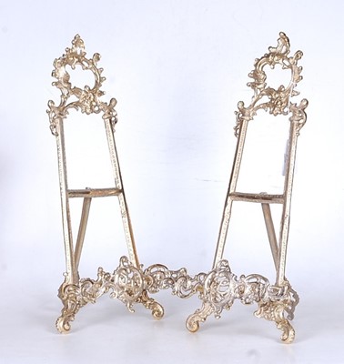 Lot 31 - A pair of reproduction brass table easels in...