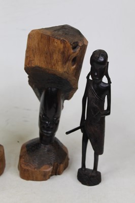 Lot 43 - A pair of African hardwood busts, each carved...