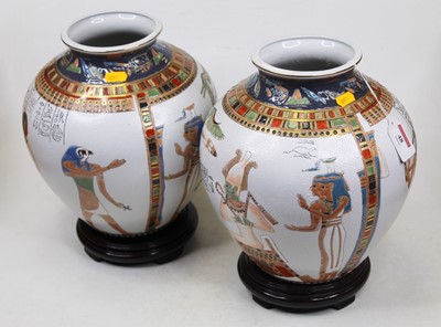 Lot 48 - A pair of modern Egyptian style vases, each of...