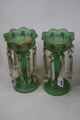 Lot 102 - A pair of early 20th century green glass table...