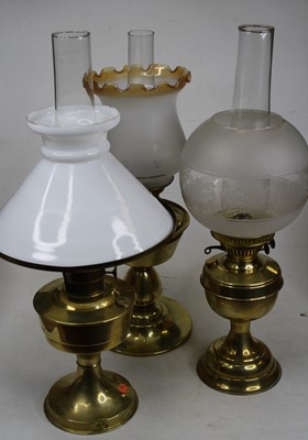 Lot 123 - An early 20th century brass pedestal oil lamp,...
