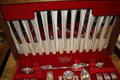 Lot 130 - A 1950s oak cased canteen of steel cutlery