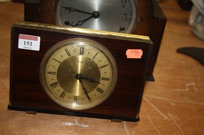 Lot 151 - A 1950s oak cased mantel clock having a...