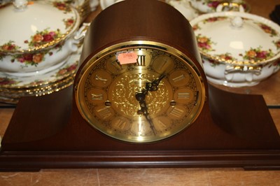 Lot 151 - A 1950s oak cased mantel clock having a...