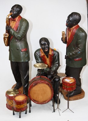 Lot 157 - A set of three reproduction resin figures of...