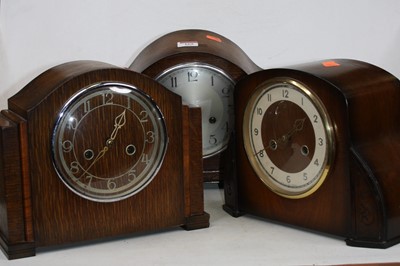 Lot 169 - A 1930s oak cased mantel clock having a...