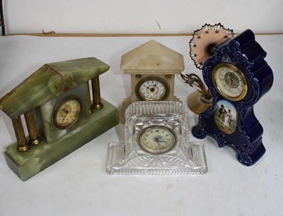 Lot 191 - An early 20th century English pottery clock...