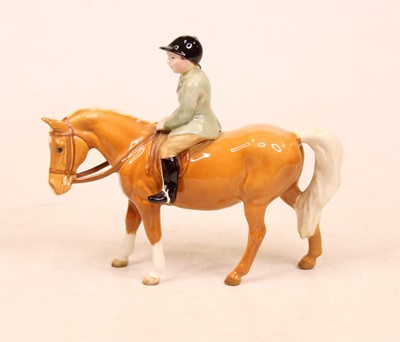 Lot 218 - A Beswick figure Boy on Pony, model No. 1500...