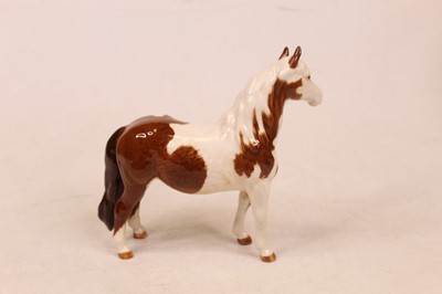 Lot 219 - A Beswick figure of a Pinto pony model No....