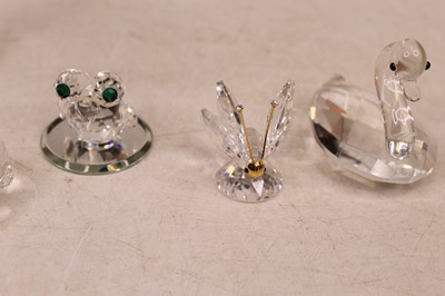 Lot 228 - A collection of Swarovski crystal ornaments to...