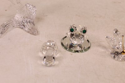 Lot 228 - A collection of Swarovski crystal ornaments to...