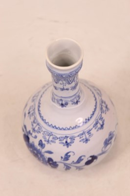 Lot 236 - An 18th century Delft blue and white bottle...