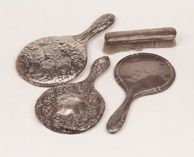 Lot 271 - An early 20th century silver-backed hand...