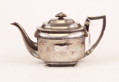 Lot 274 - A George III silver teapot, of bombe form,...