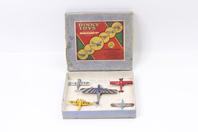 Lot 1073 - Dinky Toys pre-war aeroplanes group to include,...