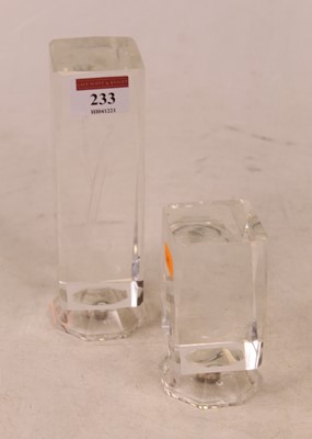Lot 233 - A modern clear glass desk ornament of canted...