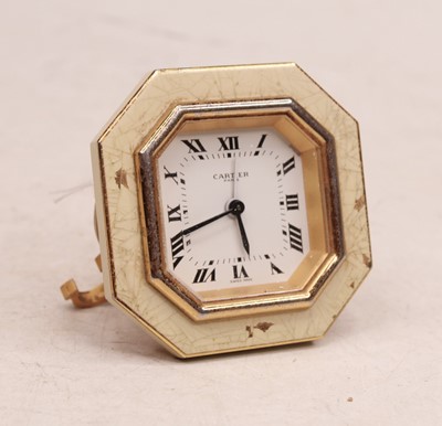 Lot 366 - A Cartier travel alarm clock, having an...