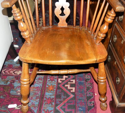 Lot 1414 - An elm and beech splat back Windsor chair,...