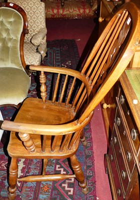 Lot 1414 - An elm and beech splat back Windsor chair,...