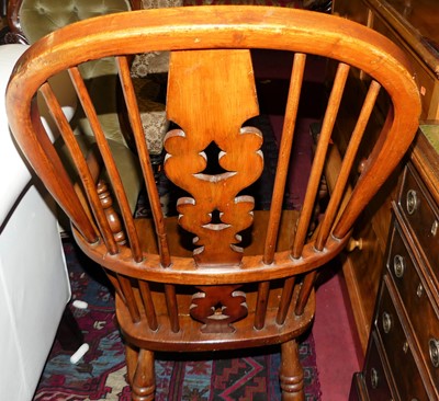 Lot 1414 - An elm and beech splat back Windsor chair,...