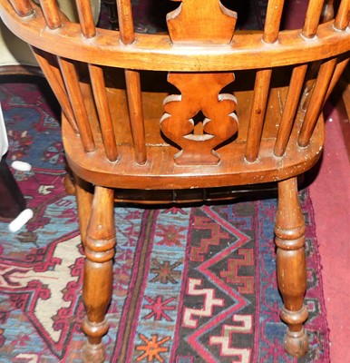 Lot 1414 - An elm and beech splat back Windsor chair,...